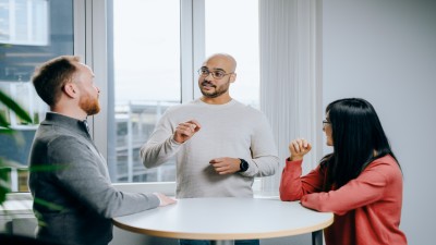 people standing and talking together